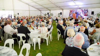 Guests at Founders' Tea 2017 in the marquee on the Gavin Relly Green